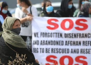 Ооган качкындары АКШнын элчилигине митингге чыгышты