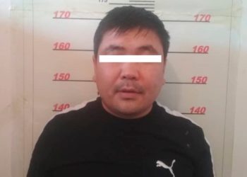 Ысык-Көлдө УКМКнын кызматкеримин деп акча талап кылган адам кармалды