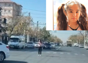 Бишкекте жол чырактын ордуна жол кыймылын жөнгө салган кыз: «Мен муну хайп үчүн кылган жокмун» (видео)