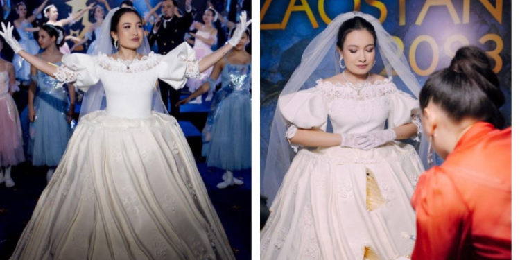 Казакстанда тойдо торт көйнөк кийип чыккан кыз сынга кабылды