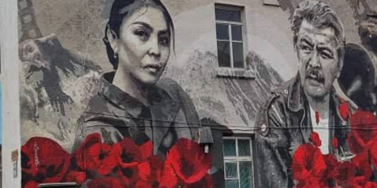 Бишкекте “Ысык-Көлдүн кызгалдактары” тасмасынын негизинде имаратка сүрөт тартылды