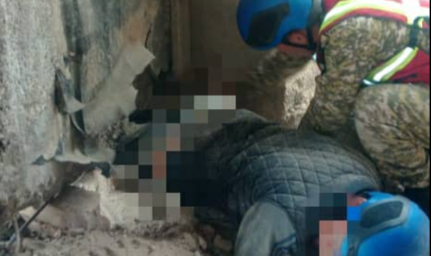 Таласта маданият үйүн бузуп жаткан жаранды бетон басып калган. Куткаруучулар жардам көрсөттү