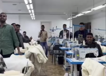 Кан тарасын денеге! Тигүүчү цехте кара жорго бийлеген чет өлкөлүктөрдүн видеосу