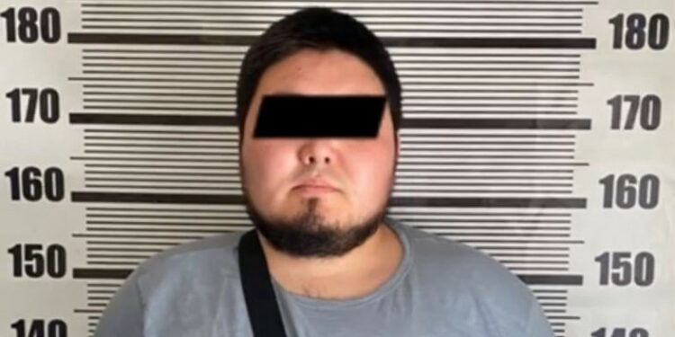 Бишкекте өспүрүм менен чатакташып, унаанын күзгүсүн сындырган шектүү кармалды